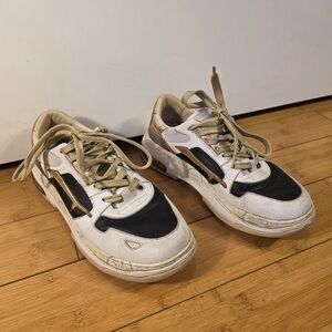 Premiata women's White, Black, and Gold Sneakers